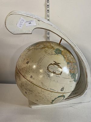 A unusual world globe in wooden surround, shipping unavailable