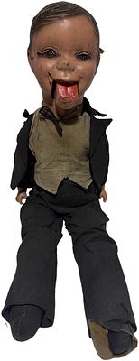 An early 20th-century ventriloquist dummy A/F. 55cm