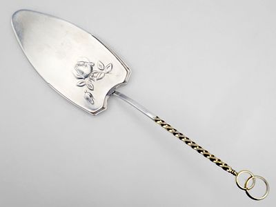 Лопатка для свадебного торта. СССР, 1974 год. 
Серебро 916 пробы, литье, штамп, 