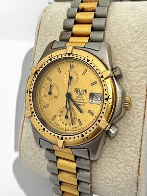 Heuer - שעון פלדה שווייצרי כרונוגרף לגבר תוצרת הוייר, מנגנון קוורץ זקוק לתיקון. רצועה