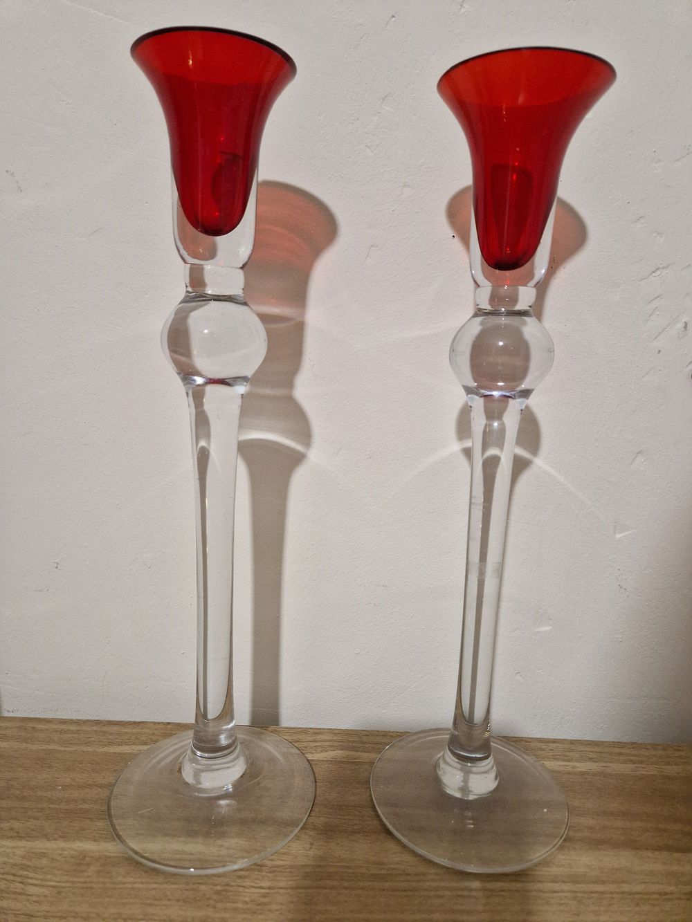 Lot 198: Two glass tall tea light holders