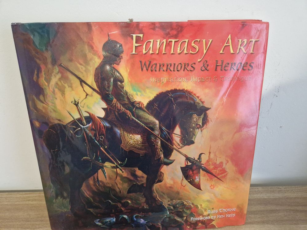 Lot 170: Warriors and hero's hard back book