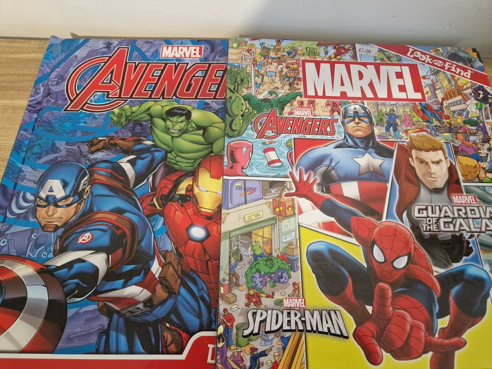 Lot 185: marvel hard back books