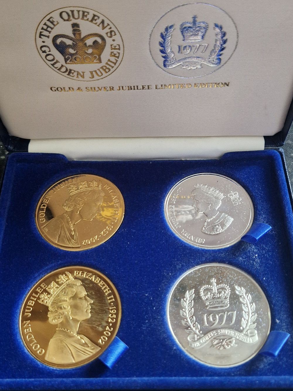 Lot 243: Limited edition gold and silver jubilee crown set