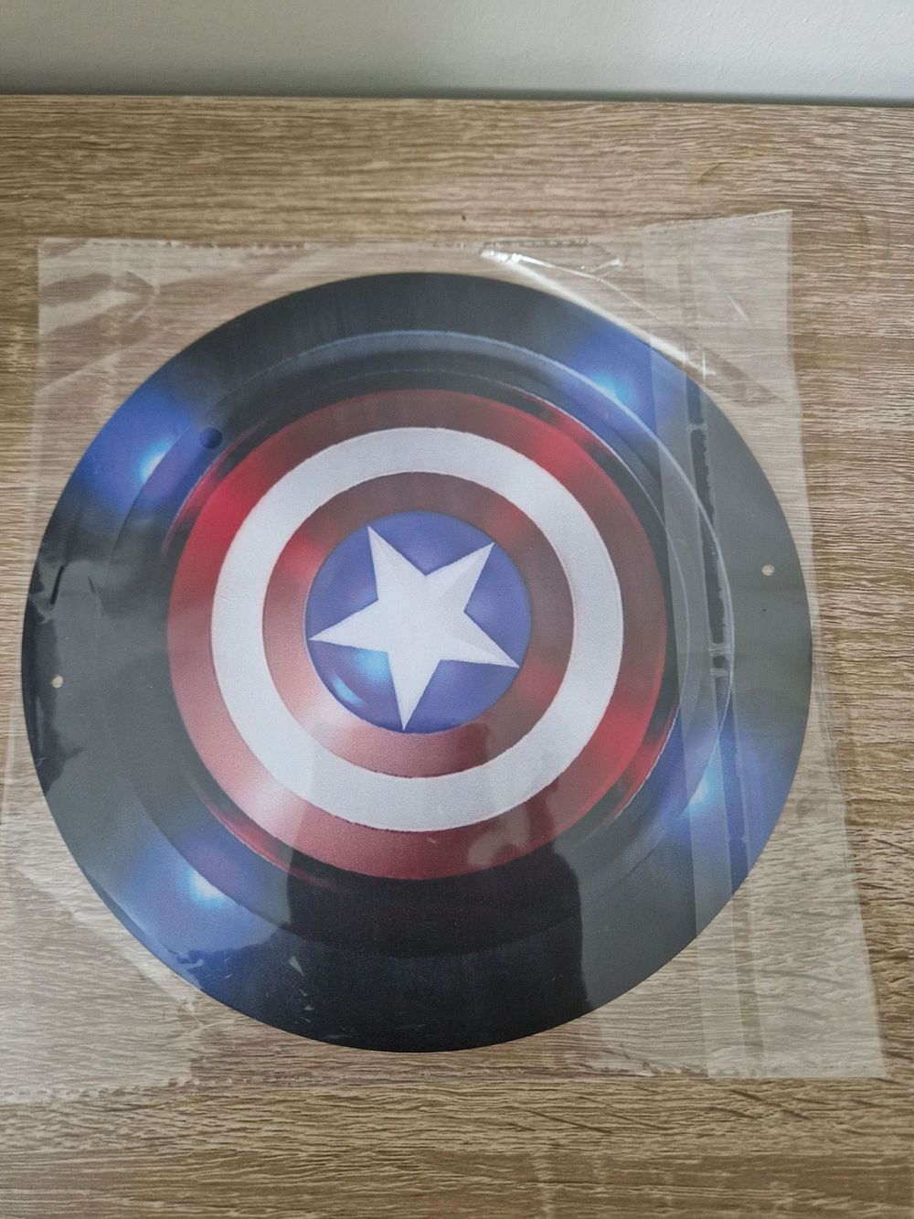 Lot 302: captain America metal sign