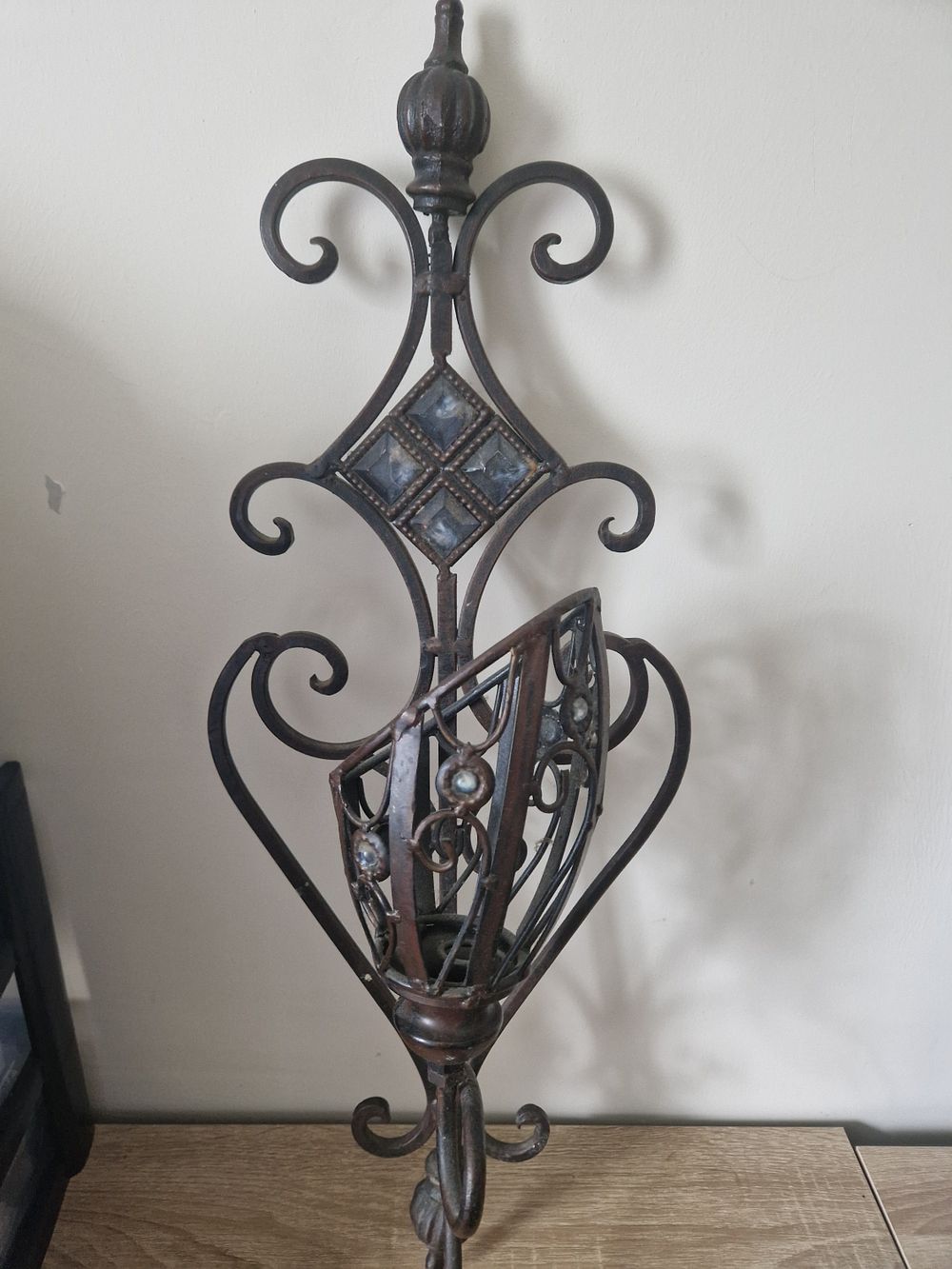 Lot 324: Cast iron candle holder