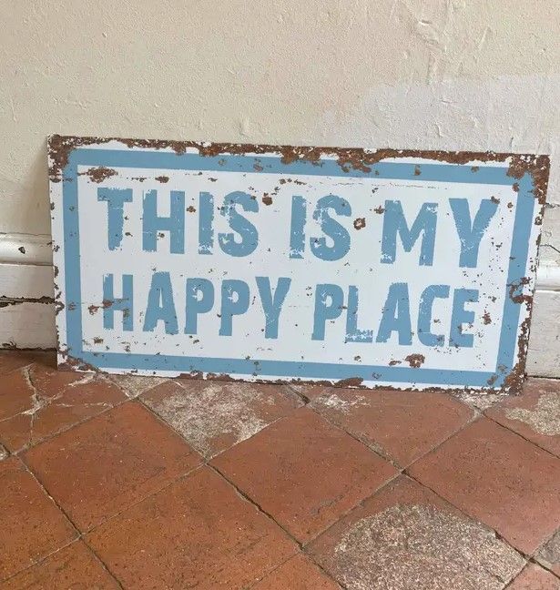 Lot 209: This is our happy place tin sign