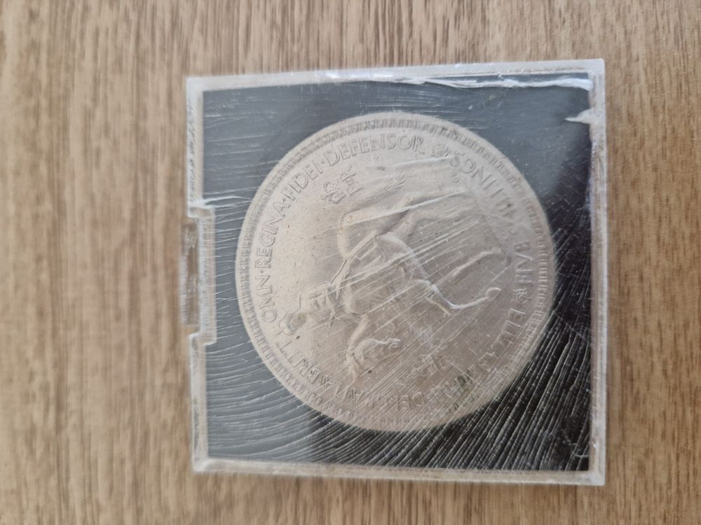 Lot 239: Vintage five shillings