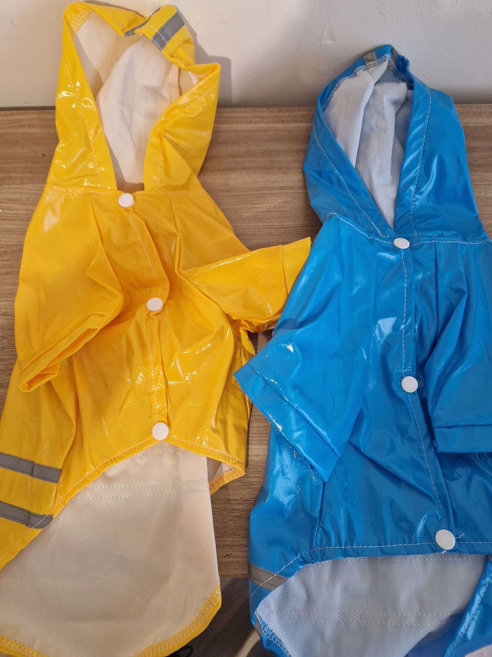 Lot 184: Two cat water prove coats
