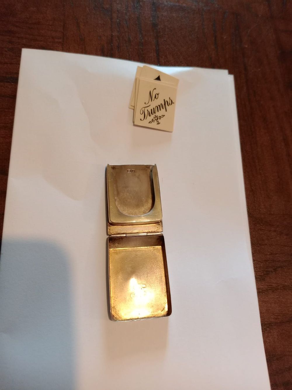 Lot 257: Small Edwardian novelty silver trump maker