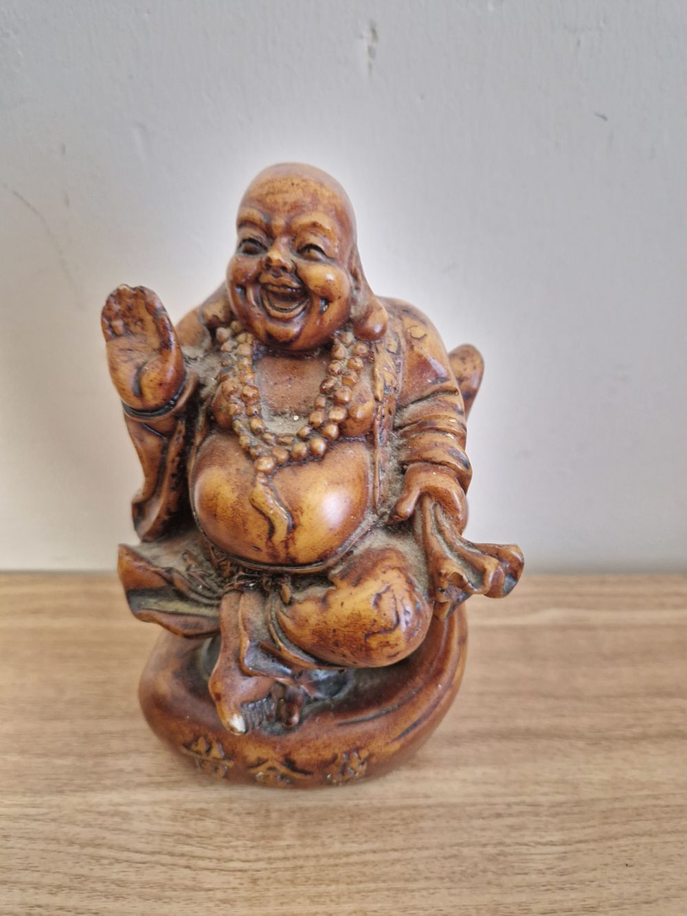 Lot 298: Laughing buddha ornament