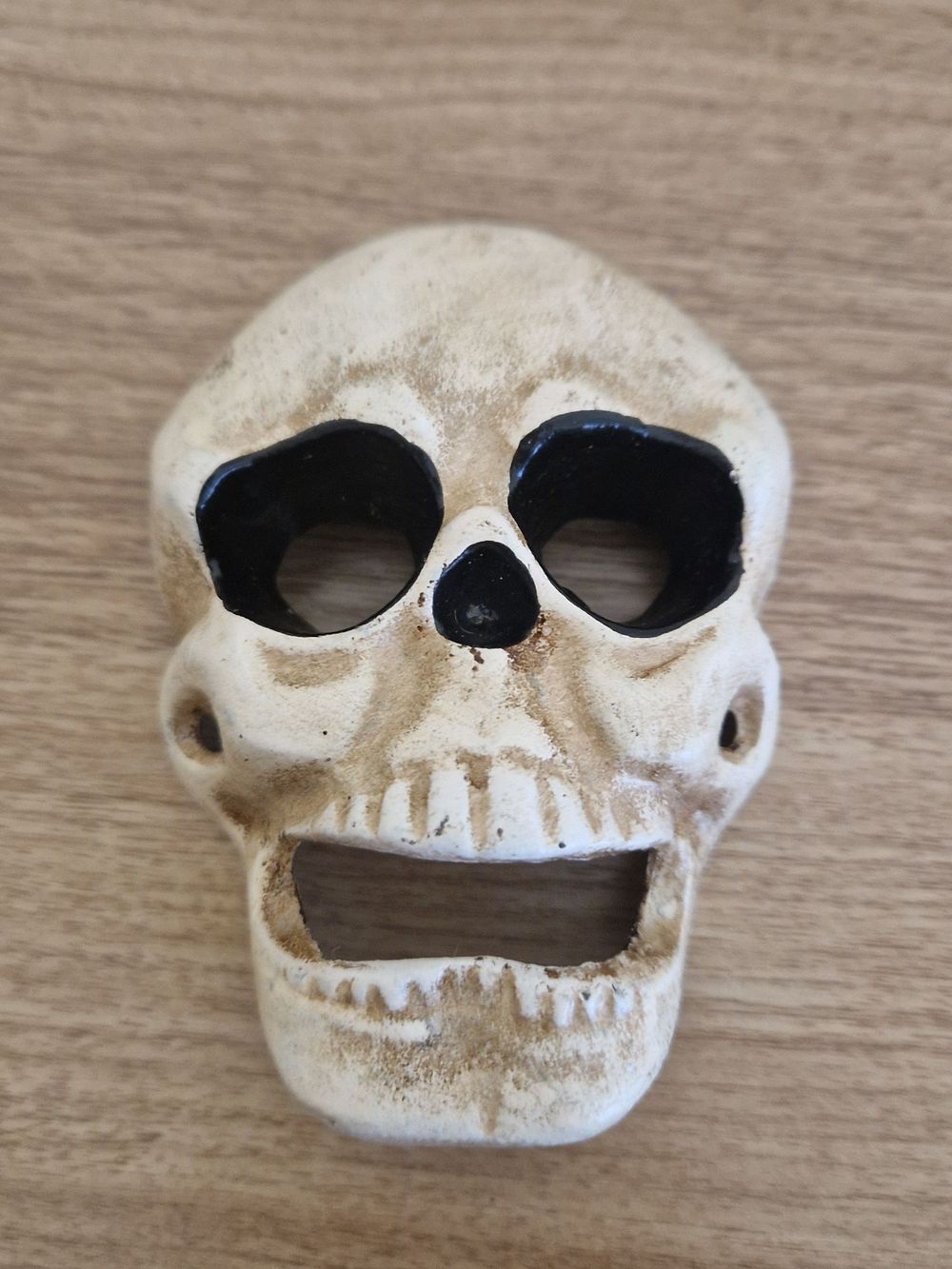 Lot 304: Cast iron bottle opener