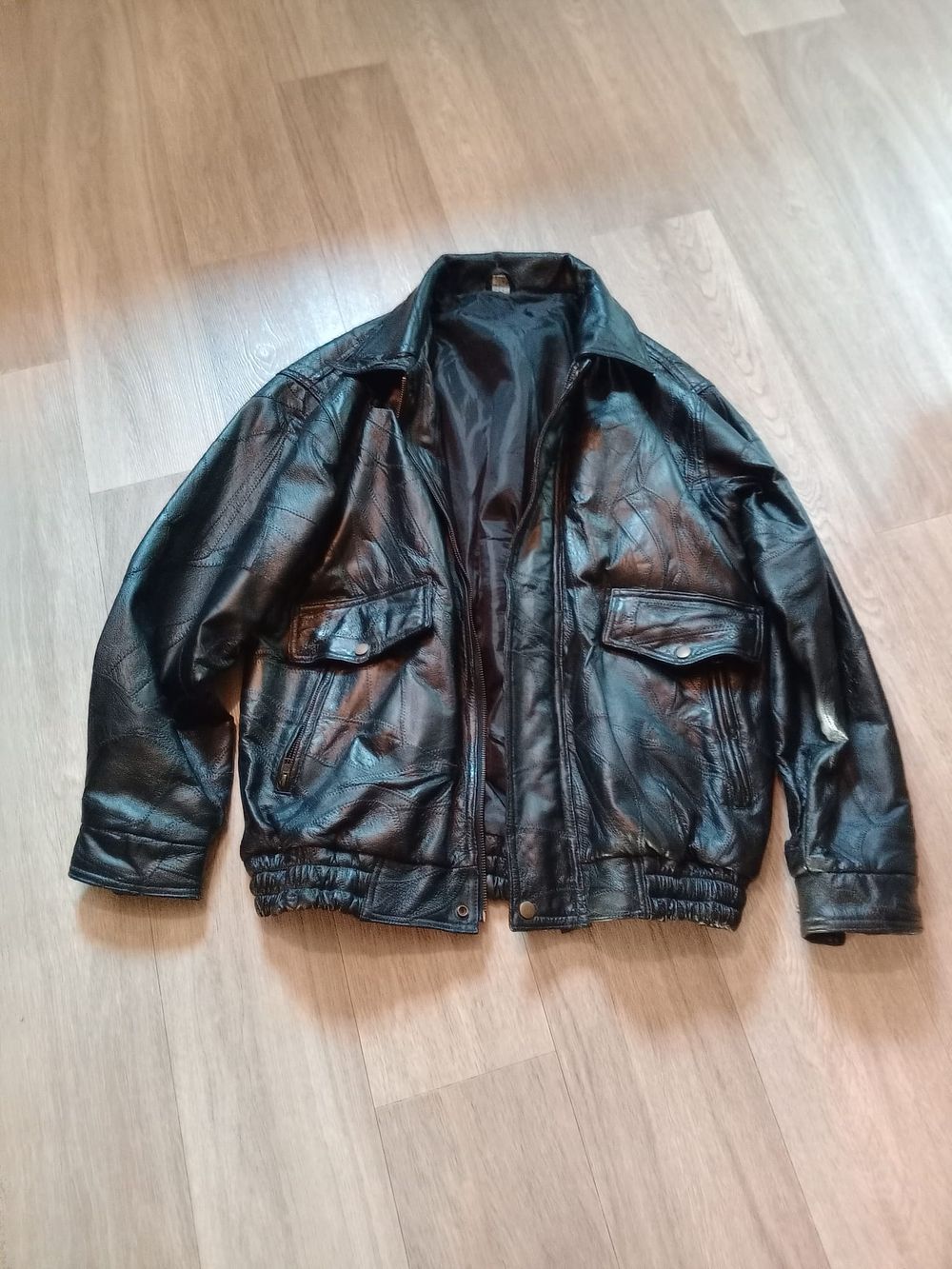 Lot 182: Black leather jacket