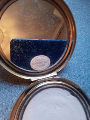 Armagh fair. Stratton powder compact.