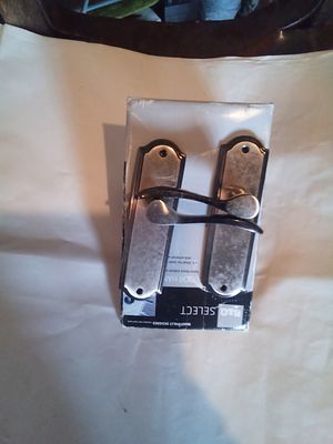 Armagh fair. Pair of new Door handles. Metal, with fixings.