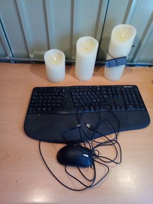 East Sussex. Microsoft key board. With set of three battery remote candles.