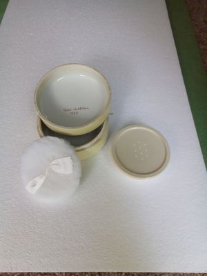 East Sussex. Vintage powder puff stamped and signed with original powder pad and powder unused 