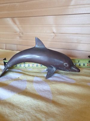 East Sussex. Two vintage brass solid dolphins. 18 cm L