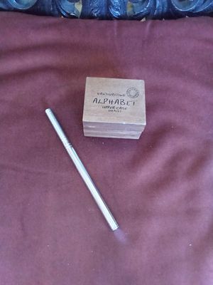 East Sussex Handwriting Antique stamp. Alphabet upper case 28 pcs. In original box. Metal cased 