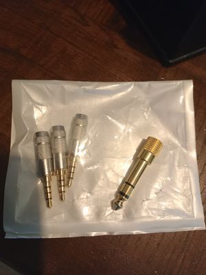 East sussex. Three new headphones jack plugs and one guitar lead jack plug new unused.