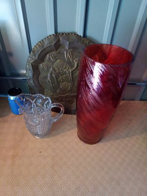 East sussex. Vintage glass jug, brass tunisian wall plaque and a big red glass and silvery gold 
