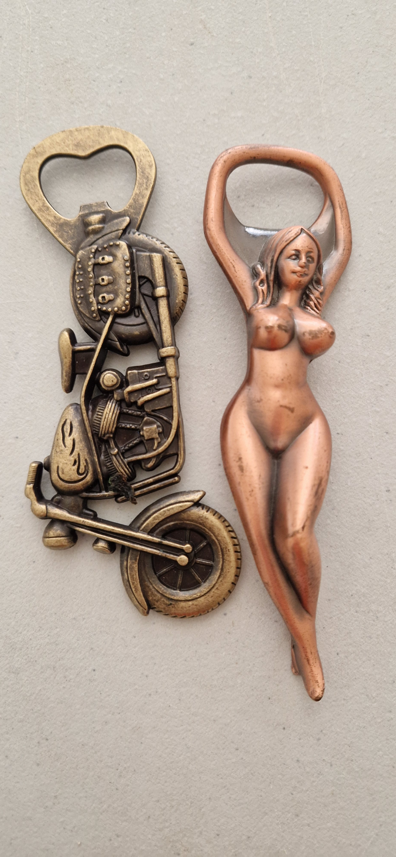 Two vintage bottle openers