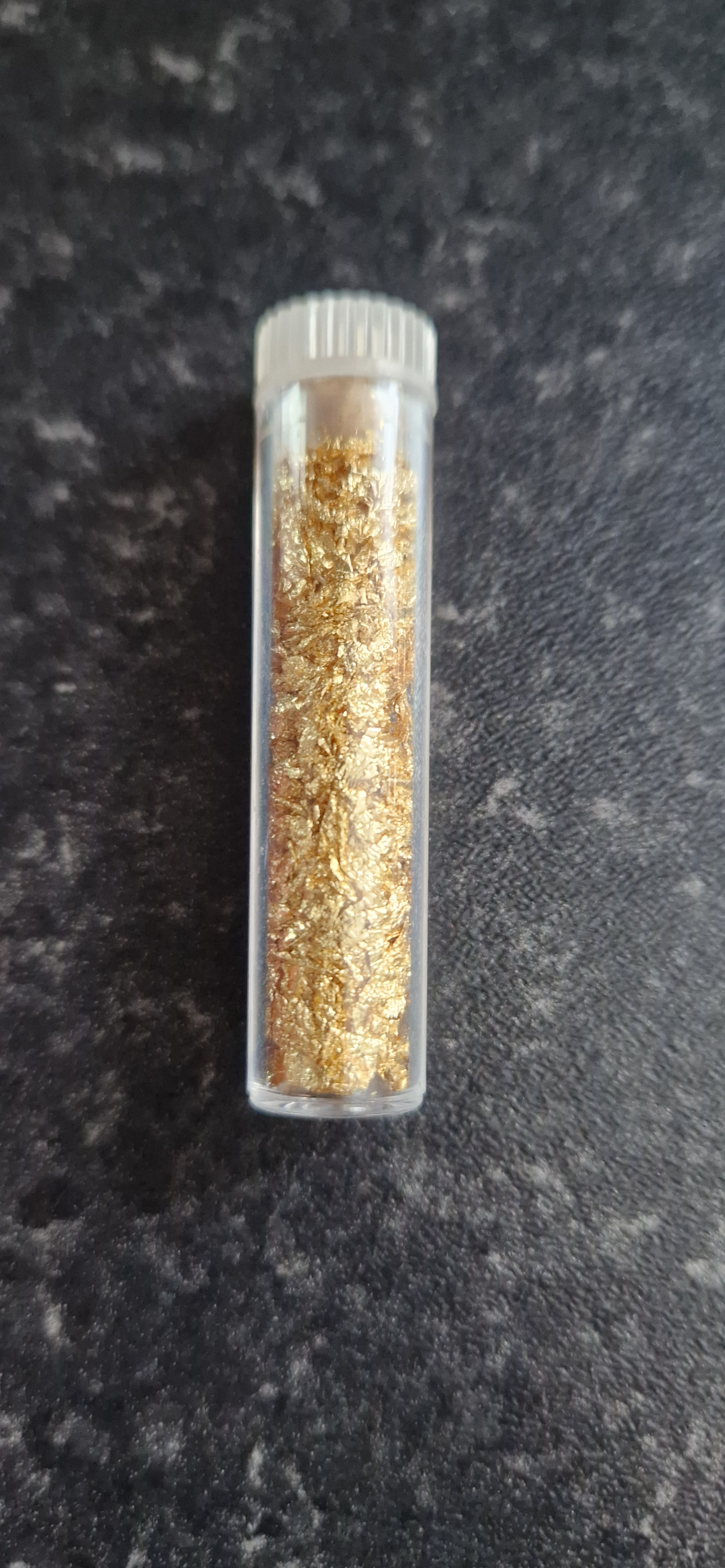 small tube of gold leaf