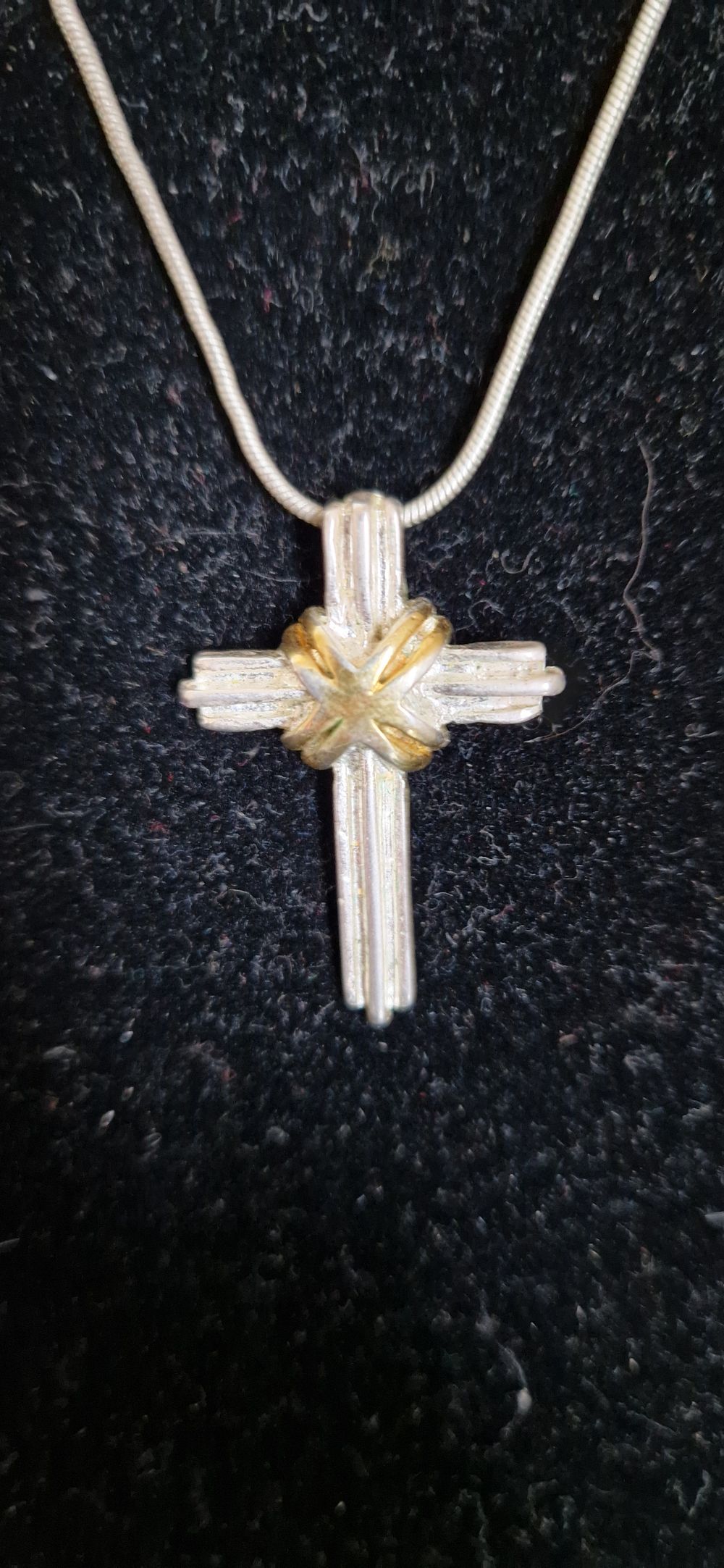 Lot 202: Silver cross and chain