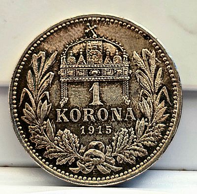 1 קורונה 1915 – הונגריה, כסף
. 1 קורונה 1915 – הונגריה, כסף 
מטבע כסף מרהיב משנת 1915, מתקופת 