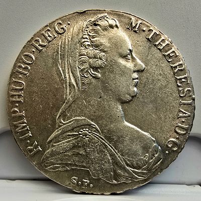 מטבע תרזה מריה טאלר 1780 – ייתכן מהדורה מוקדמת (Restrike עתיק או מקורי) 
מטבע כסף קלאסי עם 