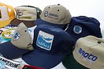 Collection Of Vintage Diving Company Hats, Stickers, Promotional Items. This is a nice Image - 1