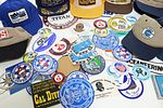 Collection Of Vintage Diving Company Hats, Stickers, Promotional Items. This is a nice Image - 3