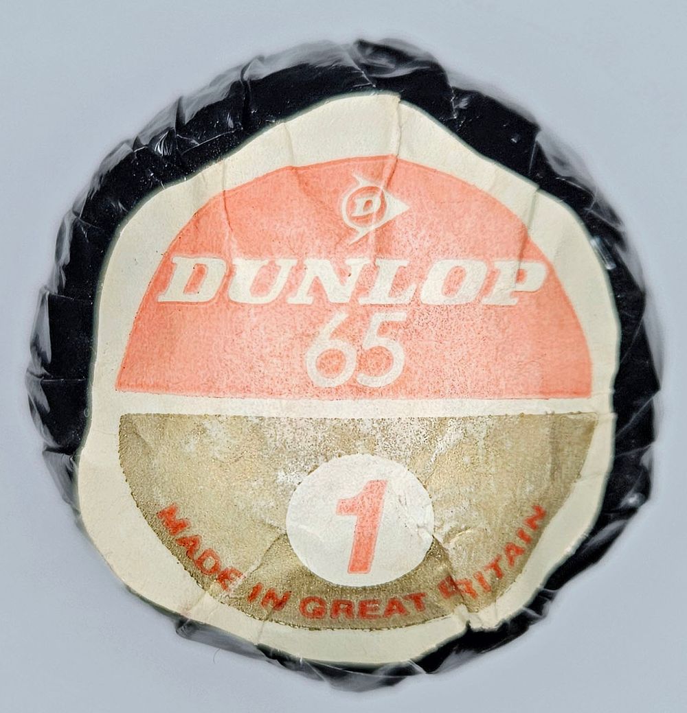 Lot 153: Dunlop 65 #1 Vintage Golf Ball In Black Wrapper