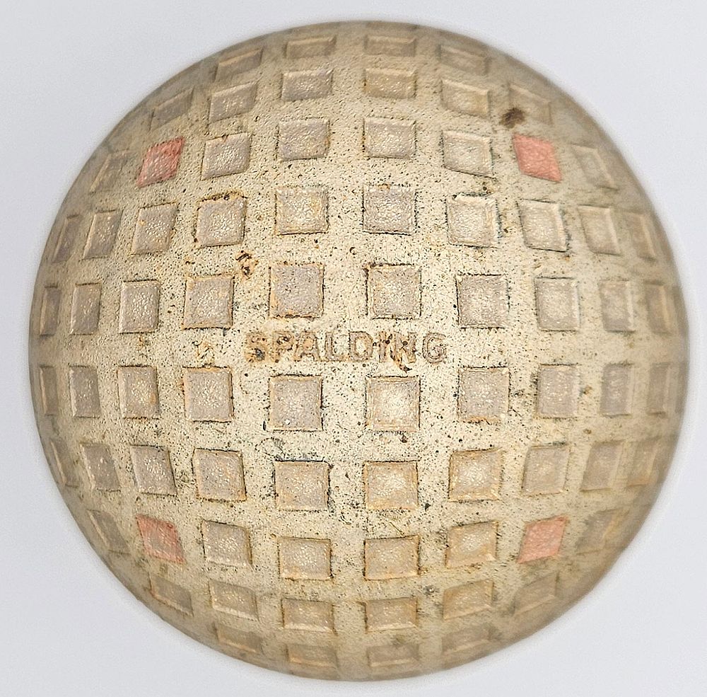 Lot 159: Spalding Square Mesh Pattern Orange Dot Antique Golf Ball
