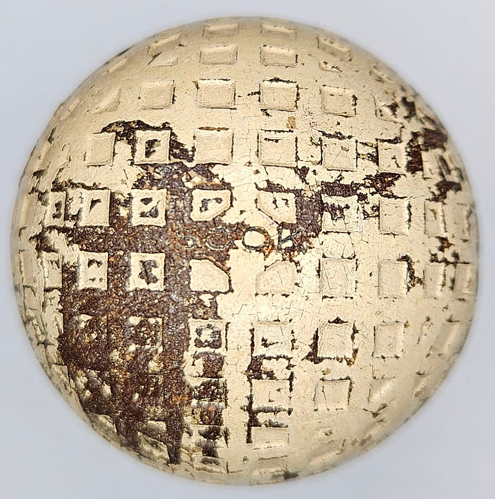 Lot 202: Sock & Putt Wilson Mesh 1920’s Antique Golf Ball