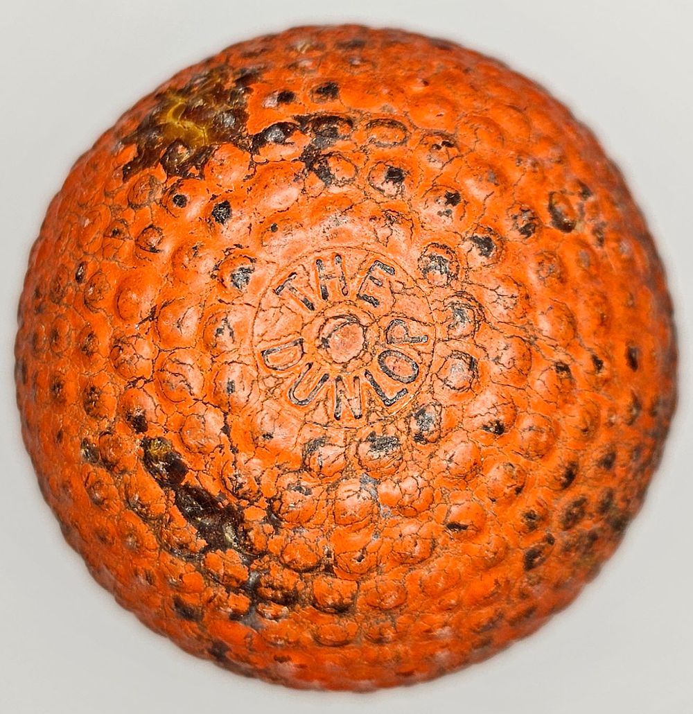 Lot 205: The Dunlop Red Bramble 1910’s Antique Golf Ball
