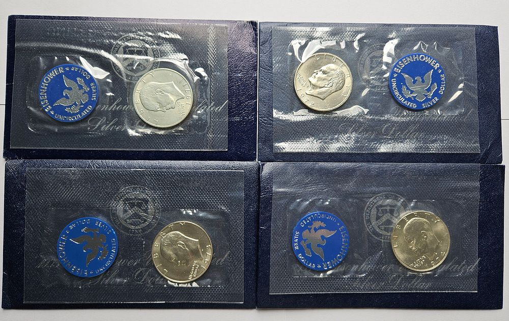 Lot 325: Four 1971, 1972, 1973, 1974 S Eisenhower 40% Silver Dollar US Mint Sets