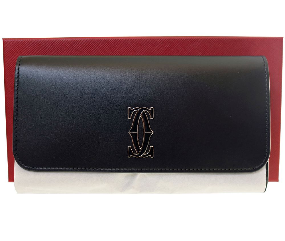 Lot 258: Cartier “C de Cartier” Black Leather Chain Wallet