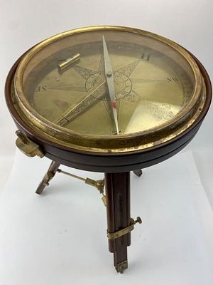 Vintage Nautical Brass and Wood Compass Side Table. 21-inch tall nautical compass featuring a 