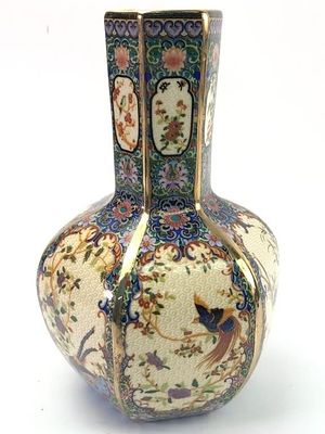 Chinese Qing Dynasty Ceramic Vase 9 Tall. A Chinese Qing Dynasty ceramic vase standing 9 inches 