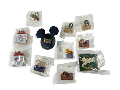 Disney Collector Pins Lot With Mickey Back. 11 Disney collector pins featuring various designs 