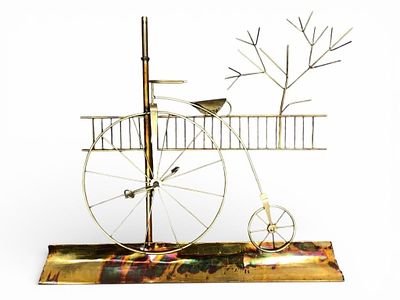 Brass Metal Sculpture Bicycle Made In Hong Kong. Brass metal sculpture featuring a vintage-style 