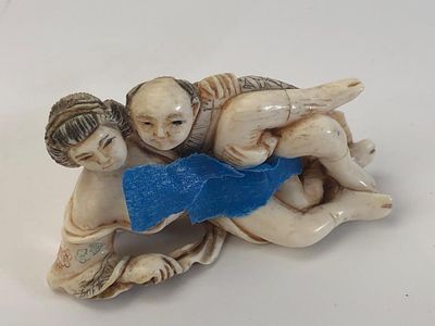 Japanese Carved and Stained Shunga Netsuke of an E. Japanese hand-carved erotic netsuke 
