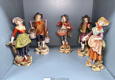 Five Capodimonte porcelain figures from the 'Cries of London' series, 27cm high. (Section 30).