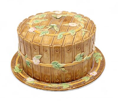 A Victorian George Jones majolica cheese dish and cover, modelled as a picket fence with 