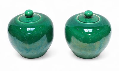 A pair of green, crackle-glaze pottery ginger jars and covers, chips to rim of one jar, covered 