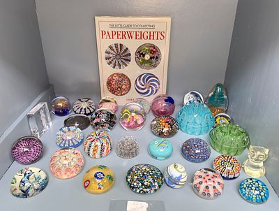 A good collection of 30 assorted glass paperweights including examples by John Deacon, dated 