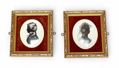 A pair of portrait silhouettes by Staffordshire Fine Ceramics, with transfer printed 