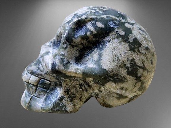 Skull sculpted in Lilac Lepidolite natural crystal gemstone. Item made from one unit of