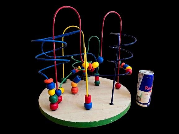 Large, high-quality bead maze - wood and metal. The drink can is for illustrative purposes only